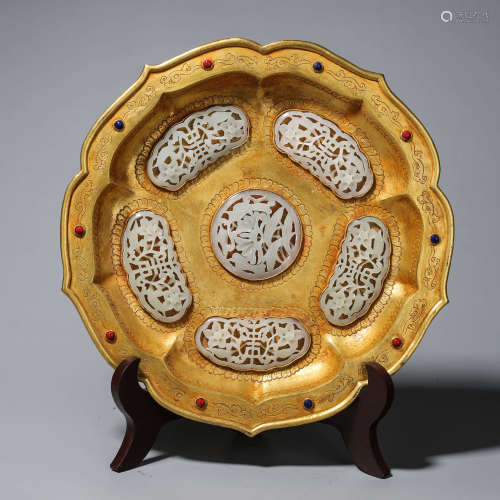 A jade-inlaid golden plate