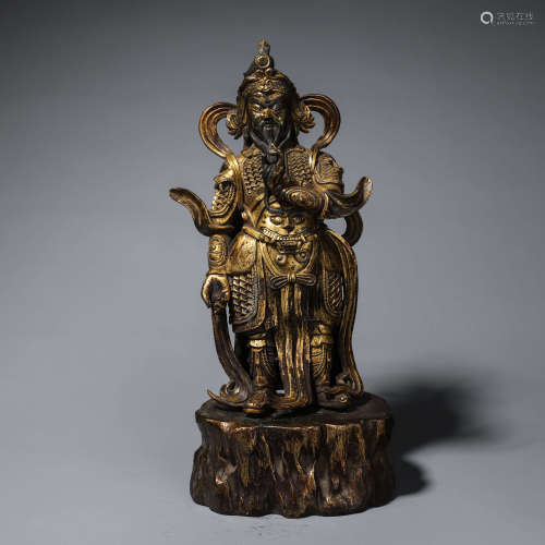 A gilding copper Guangong statue
