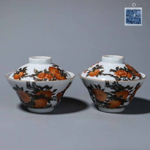 A pair of famille rose fruit porcelain tea cups