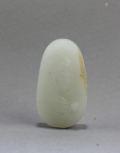 A Carved Jade Pendant