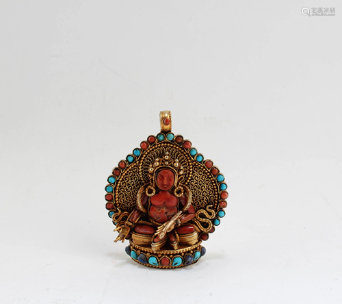 A Pendant with a figure of Jambhala, a God of