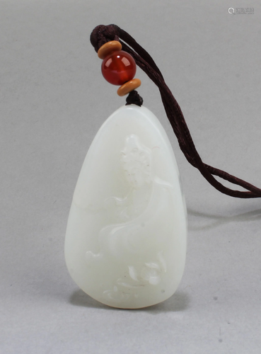 A Carved Jade Pendant with necklace