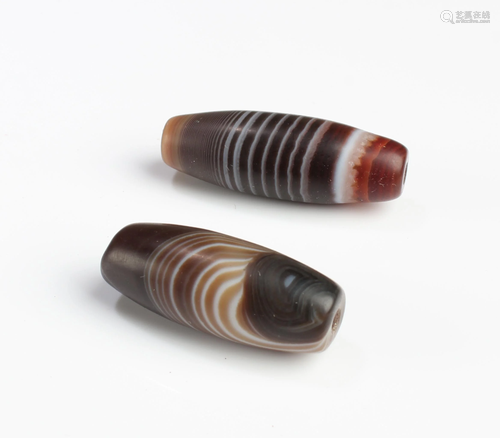 A Group of Two Dzi Beads