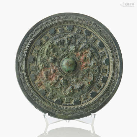 A Chinese Bronze Mirror with Inscriptions