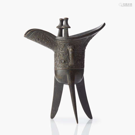 A Chinese Archaistic Bronze Tripod Vessel (jue)