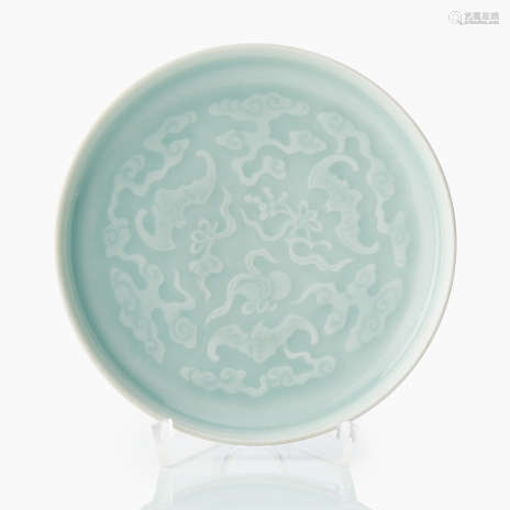 A Chinese Celadon Glazed Relief-Decorated Shallow Bowl