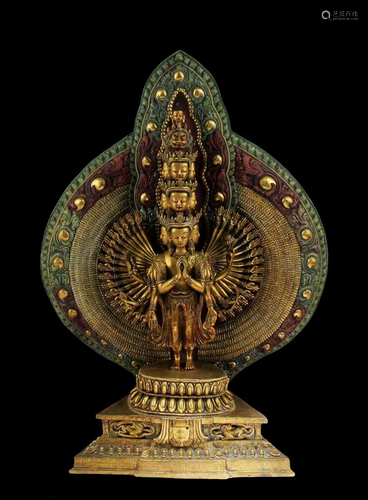 A Gilt Bronze Standing Thousand Arms Buddha of