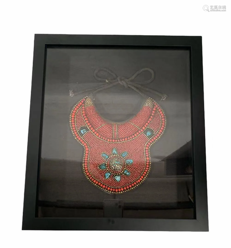 A framed, hand-braided Turquois & Coral Necklace,