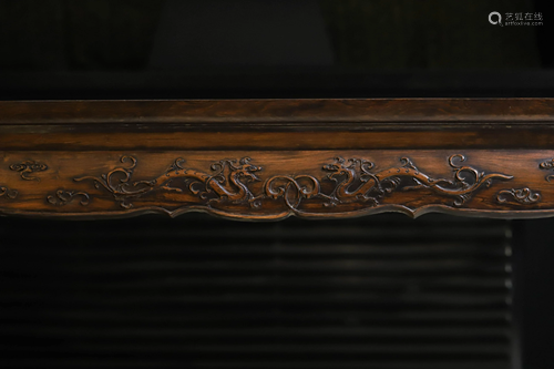 An used Huanghuali-STYLE Dragon Long table