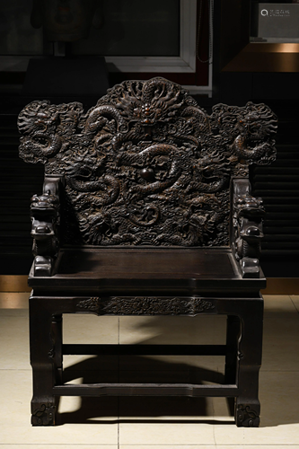 An used Carved Hardwood wood Dragon Chair