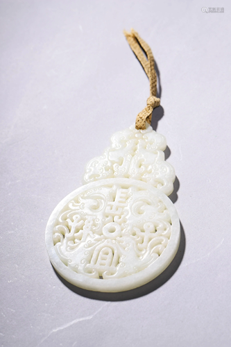 A Carved Jade Guanyin Pendant