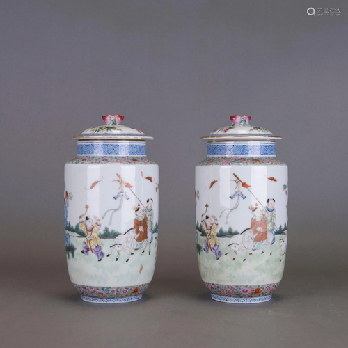 A PAIR OF FAMILLE ROSE 'BOYS' JARS AND COVERS