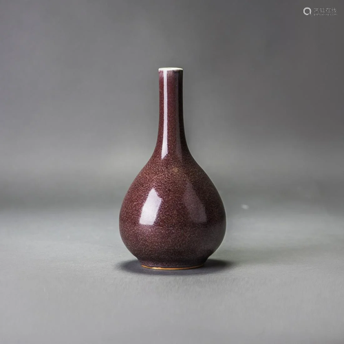 A CHINESE IRON-RUST-GLAZED BOTTLE VASE