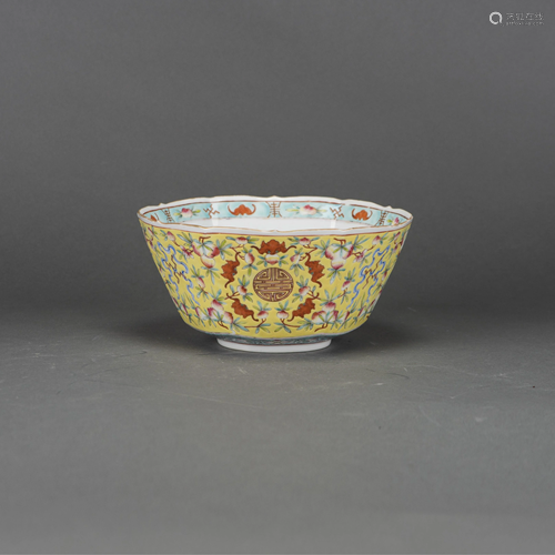 A FAMILLE ROSE YELLOW GROUND SHAPED BOWL