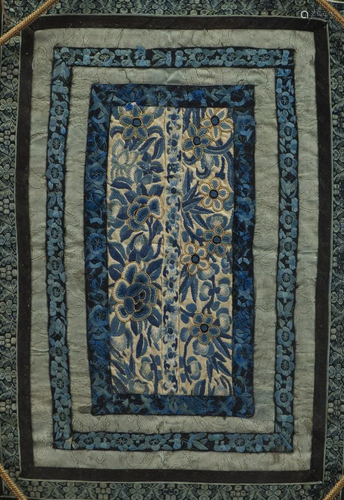 AN EMBROIDERED SILK OF FLORAL MOTIF