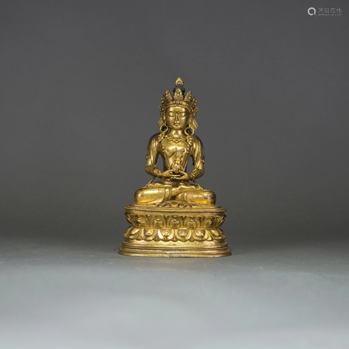 A GILT-BRONZE FIGURE OF GUANYIN