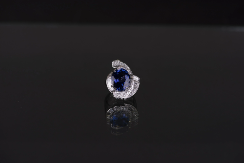 13.84CT TANZANITE AND DIAMOND RING, WITH GIA AND AIG