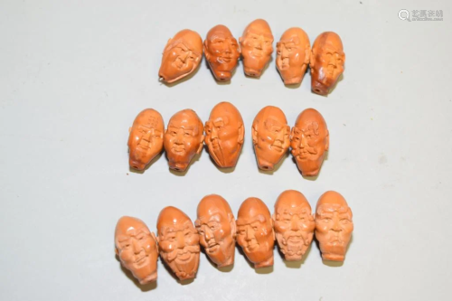 Group of Chinese Nut Carved Rohan Head Beads