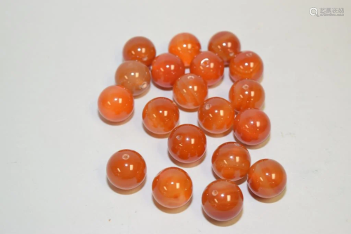 Group of Chinese Red Agate Carved Beads
