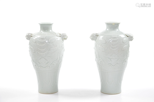 A Pair of Chinese White-Glazed Vases