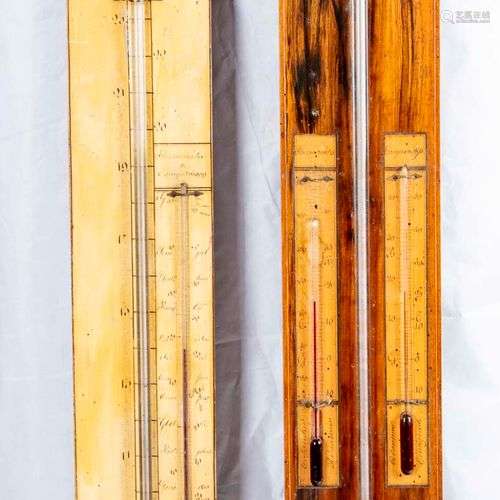 Deux baromètres en bois de placage Un des deux signé DEBOURG...