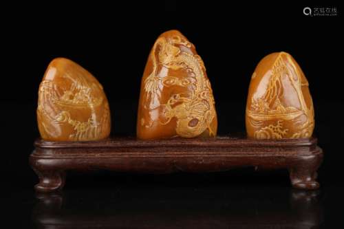 a set of three chinese tianhuang stone ornaments