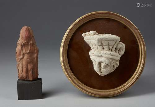 Arte Indiana A terracotta figure and a Gandhara stucco head ...