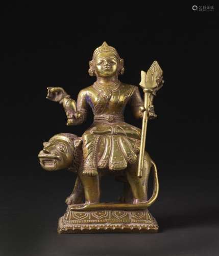 Arte Indiana A bronze figure of Durga over the lion India, O...