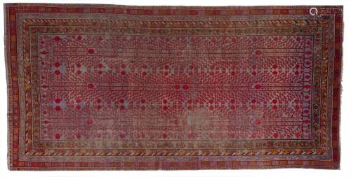 Arte Islamica A large Khotan Samarkand carpet with pomegrana...