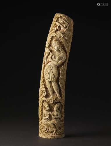 Arte Indiana A large ivory carving depicting a woman pouring...