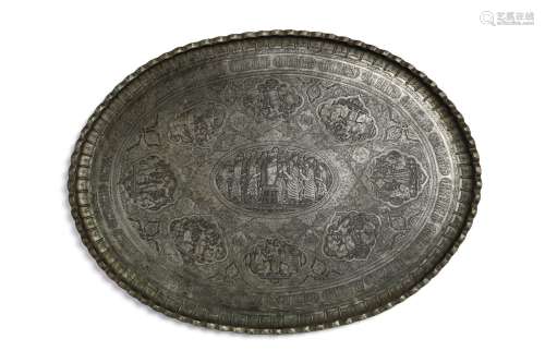 Arte Islamica A large tinned copper oval tray decorated with...