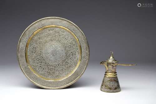 Arte Islamica Two Cairoware brass items: a round tray and a ...