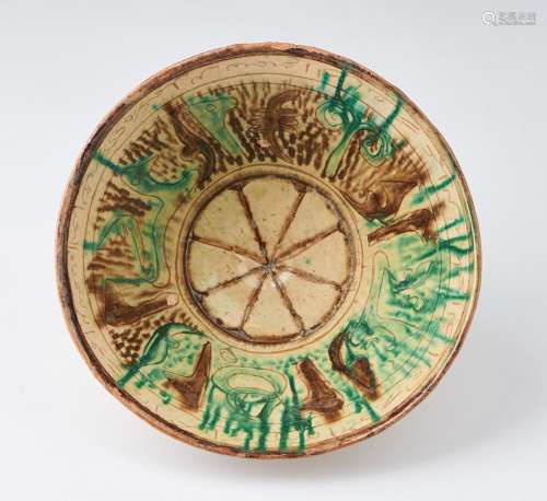 Arte Islamica An earthenware splash glazed bowlAfghanistan, ...