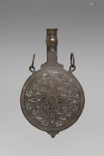 Arte Islamica A brass engraved powder flask North Africa or ...