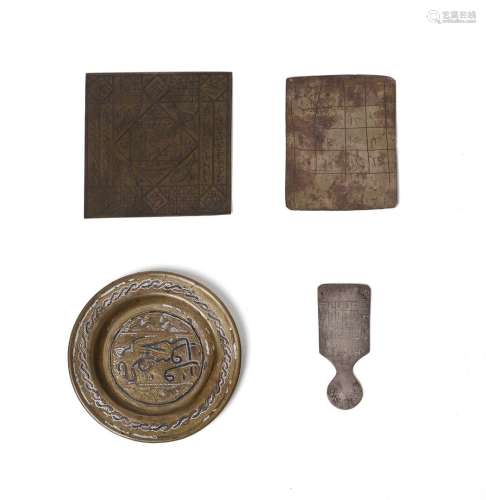 Arte Islamica A group of three talismanic metal plaques and ...
