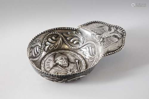 Arte Islamica A silver cup embossed with a bishop and a two-...