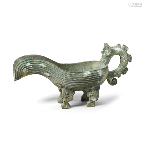 A cast bronze pouring vessel, yi Western Zhou period