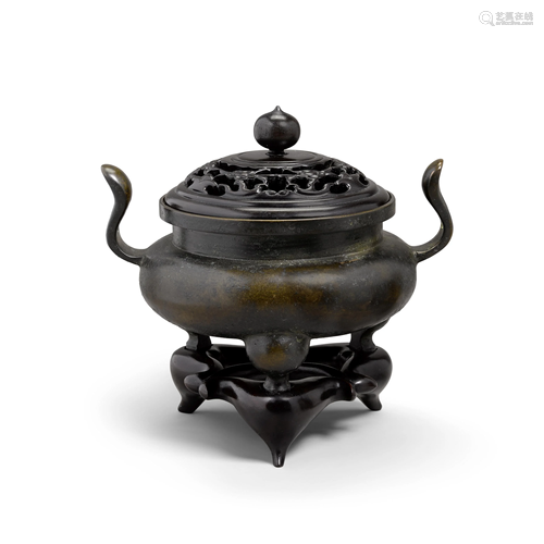 A cast bronze tripod censer Xuande 5th year seal mark