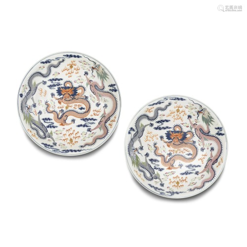 A pair of large famille rose enameled dragon dishes