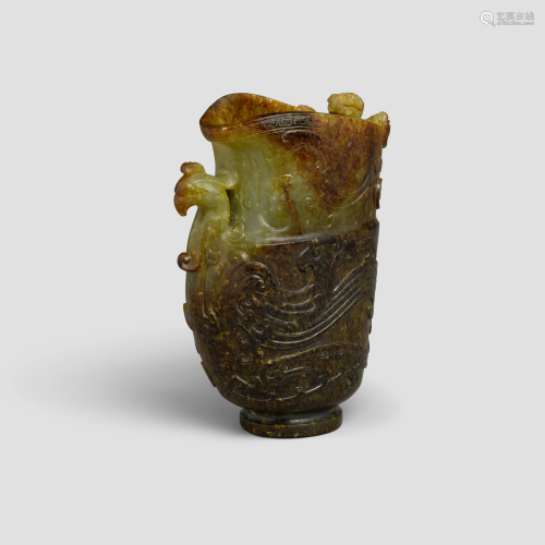 A russet and green jade rhyton cup Ming style