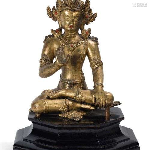 Statuette en bronze doré, représentant un boddhisattva assis...