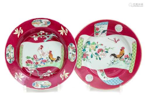 A pair of ruby red famille rose cockerel plates