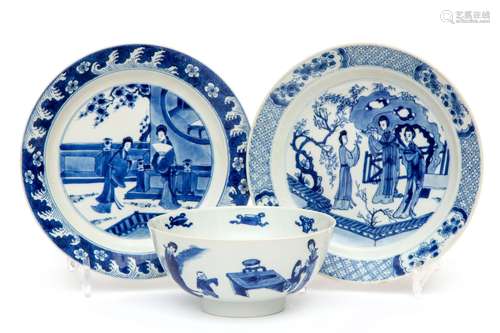 Two blue and white plates and a bowl