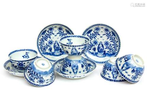 A set of cups and saucers blue and white 'Charitas'