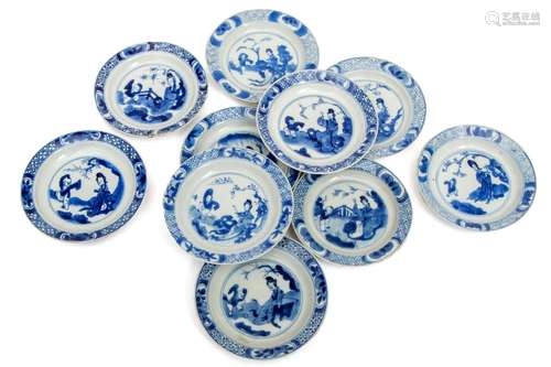 Ten Small Blue and White Plates