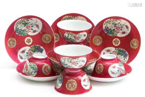 Six cups and saucers ruby ground famille rose