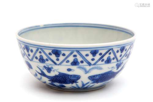 A small blue and white fish pattern bowl