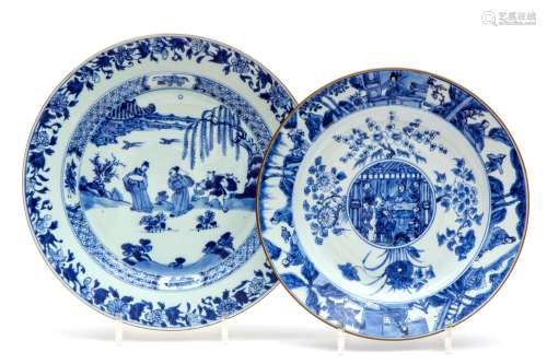Two blue and white large plates