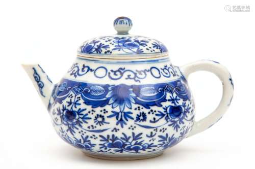 A small blue and white teapot