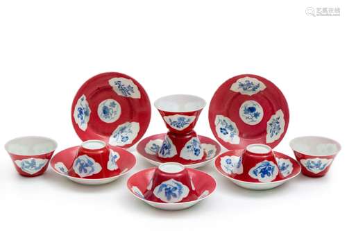 Seven cups and six saucers ruby ground with blue enamel